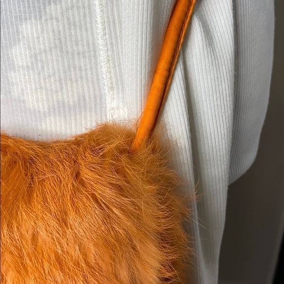 Wilsons Leather Maxima Orange Rabbit Crossbody Bag - Picture 11 of 12